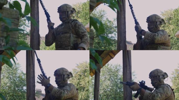 面目模糊的男性士兵在准备军事演习或战斗时戴着防护头盔巴拉克拉瓦面具，将喇叭固定在机枪上并瞄准。乌俄战