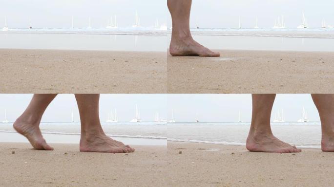 沿着沙滩行走的脚的细节