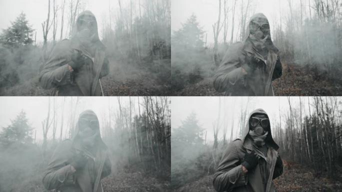 一名男子戴着防毒面具，烟雾弥漫。幸存者跟踪后的核或化学战争在空死森林