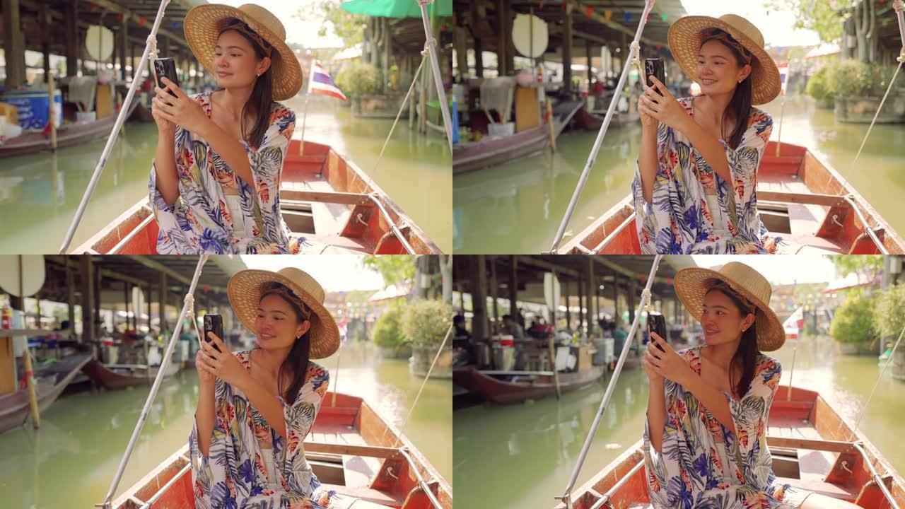泰国水上市场，亚洲旅游妇女在水上市场旅行木船。