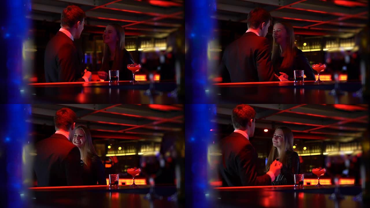 情侣在酒吧柜台附近跳舞，在俱乐部偶然相识，夜生活方式