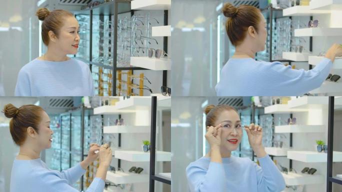 亚洲高级女性步行去挑选你喜欢的眼镜，并在眼镜店试戴新眼镜。微笑的老女性戴着新眼镜，看着相机，眼科诊所