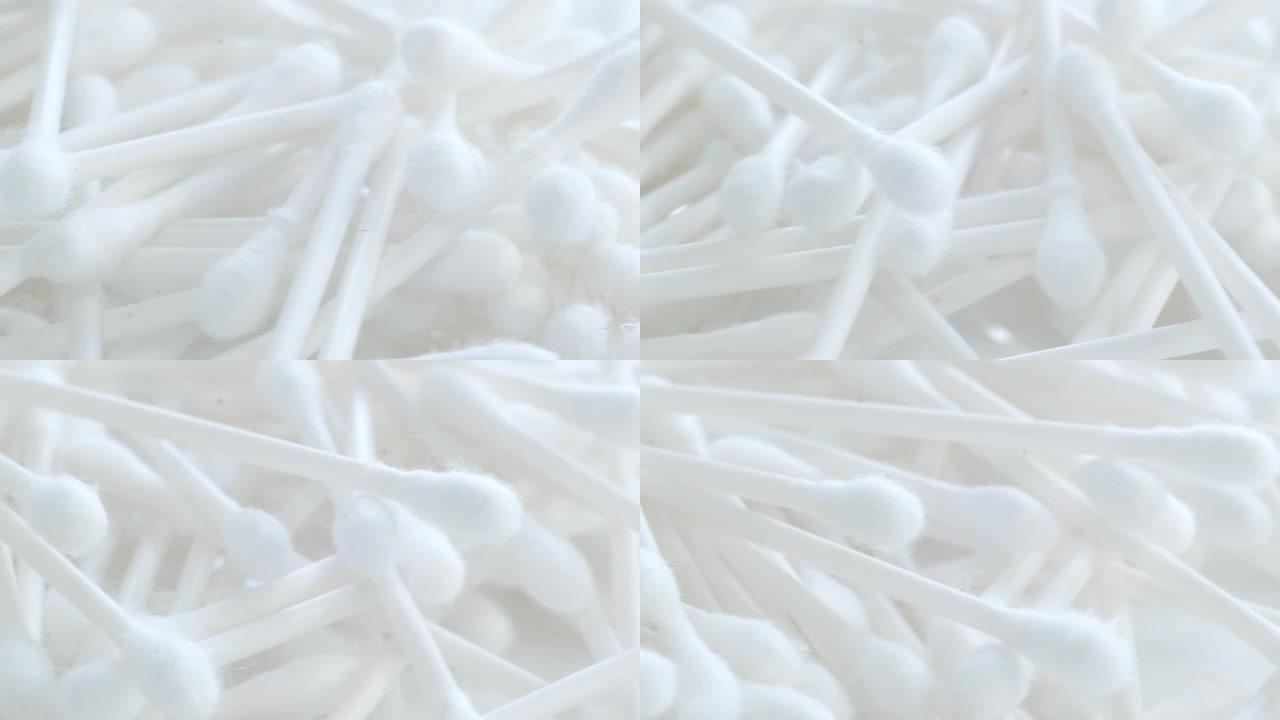 棉芽旋转成圆圈的宏观视频。