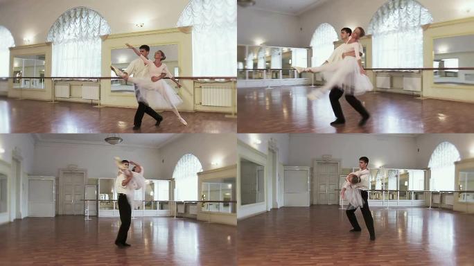 夫妇在健身房练习古典芭蕾舞，慢动作