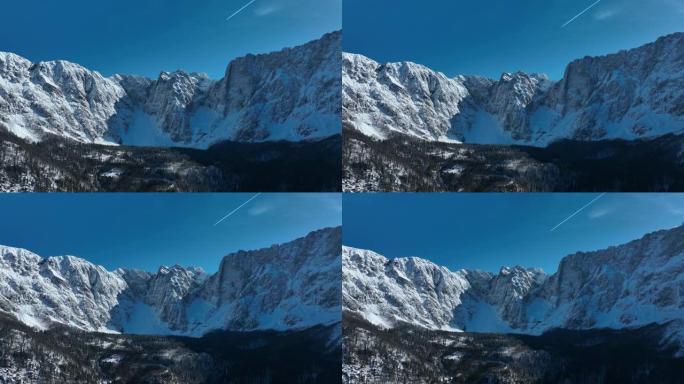 晴天空中无人机拍摄雪山链