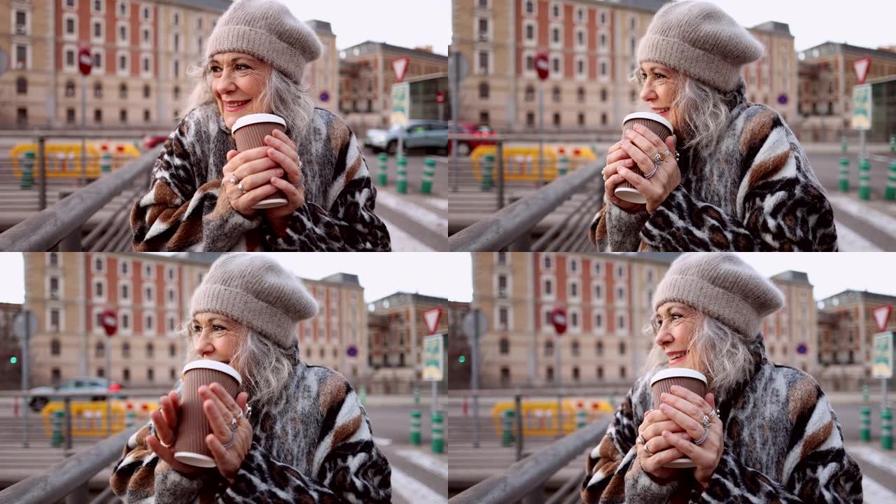 头发花白的高级女人，冬天在街上冷了一杯咖啡