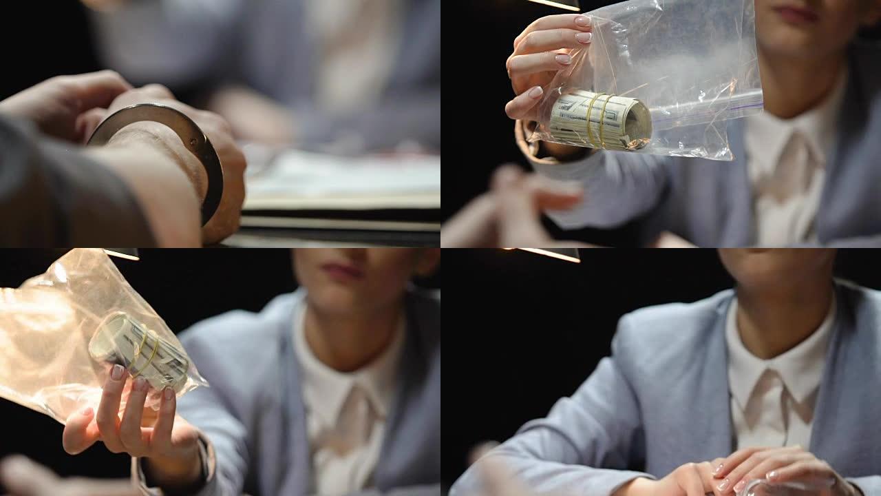 一名女调查员展示了装在塑料袋里的钞票，财务欺诈