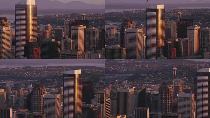 日出时的西雅图和太空针塔鸟瞰图。