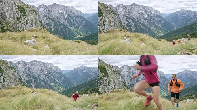 DS男女运动员登上陡峭的山腰