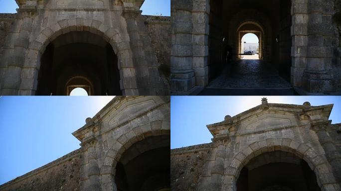 卡斯凯斯城堡的古石拱形入口，末端有庭院，顺序