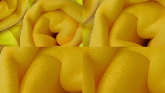 黄色和橙色海绵泡沫卷