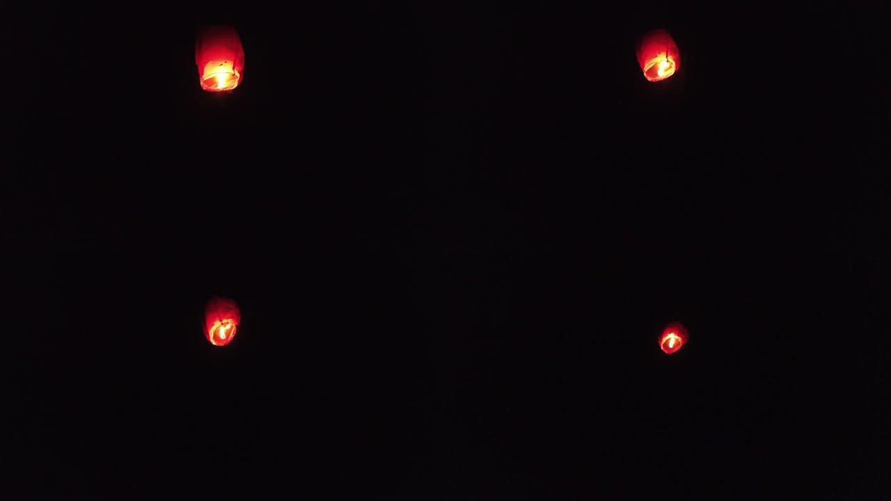 夜间天空中漂浮的灯笼的常规镜头