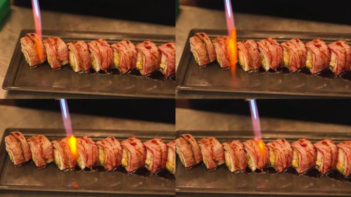 寿司被煤气炉烧焦。