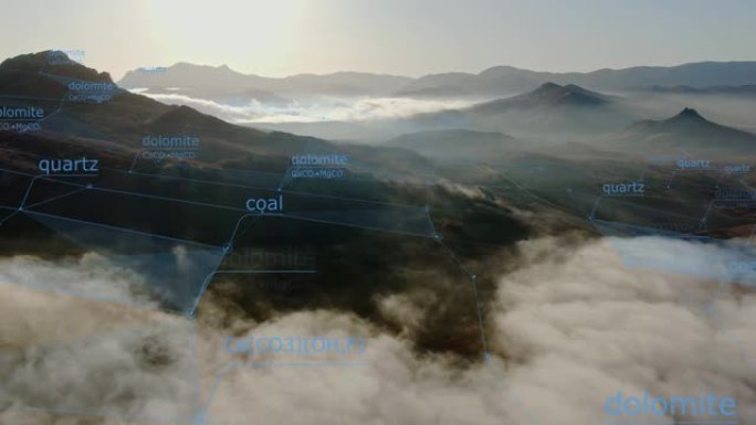 山区背景上的计算机图形会移动带有矿物名称的交互式地图。区域底土研究与开发的概念