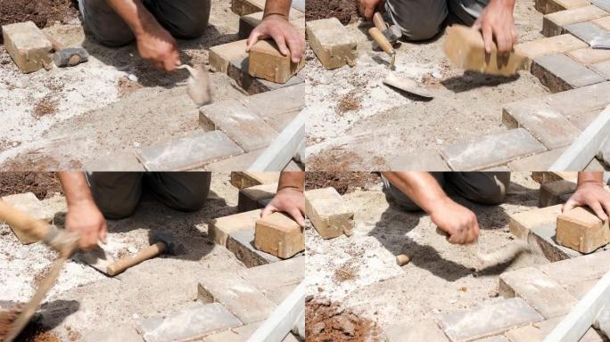 巴西和建筑工人使用抹子和槌来铲平沙土。
