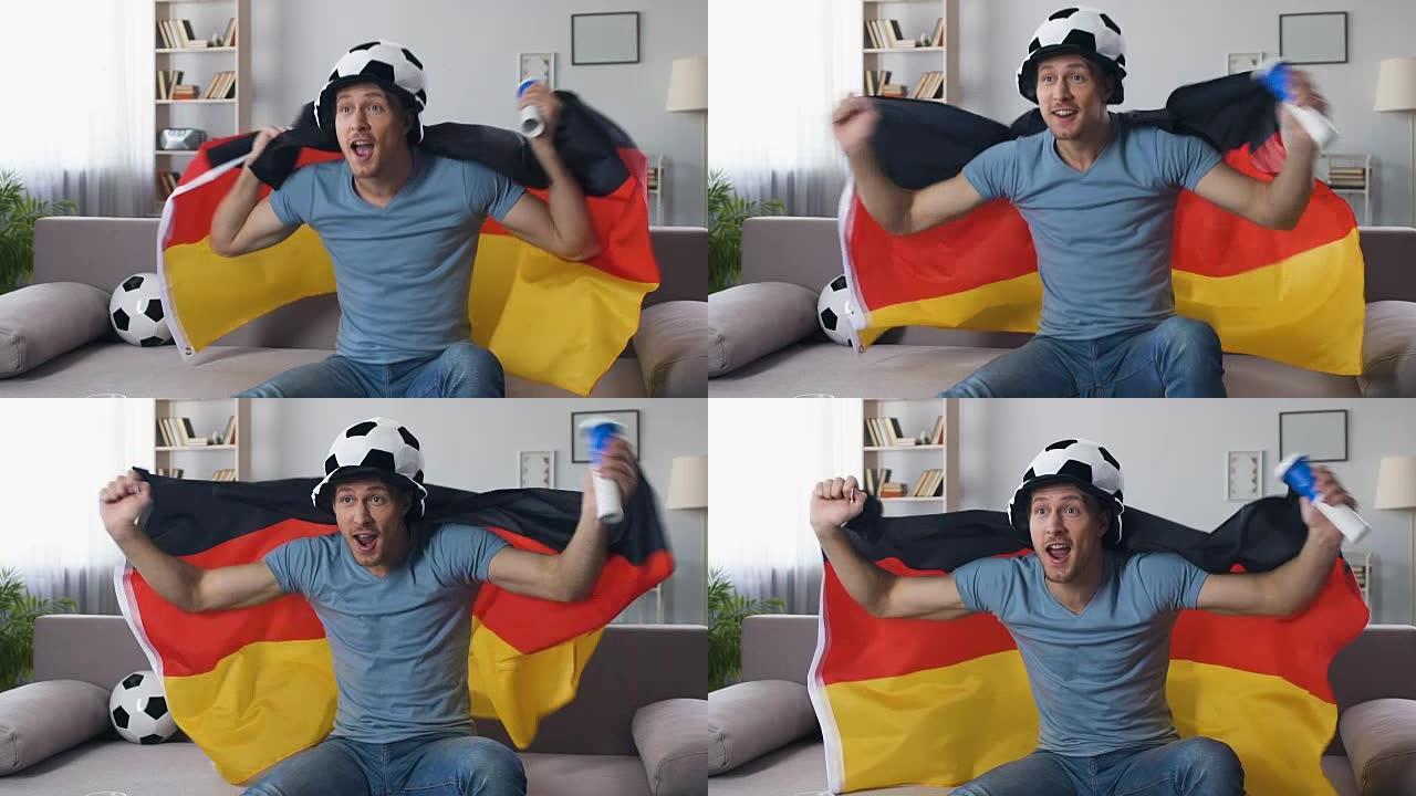 德国足球迷庆祝国家队胜利，举旗跳跃