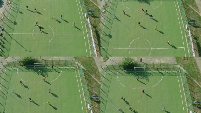 学校大学队踢足球，积极休息的鸟瞰图