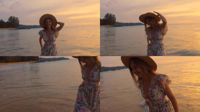 一位女性旅行者在日落时在热带沙滩上捕捉生命，自由和享受的本质