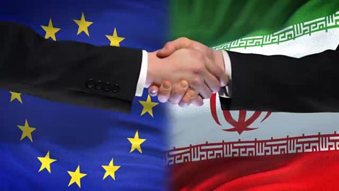 欧盟与伊朗握手，国际友谊，旗帜背景