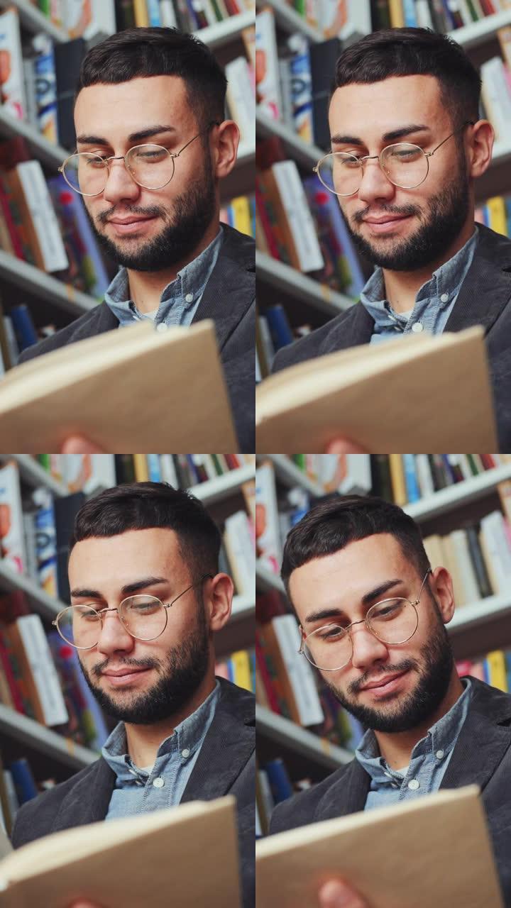 垂直屏幕: 在书店里戴眼镜的人看书