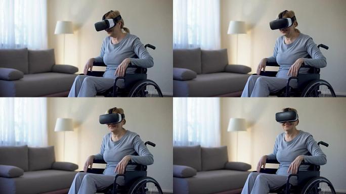 坐在轮椅上的退休妇女戴着vr护目镜，享受游戏，技术