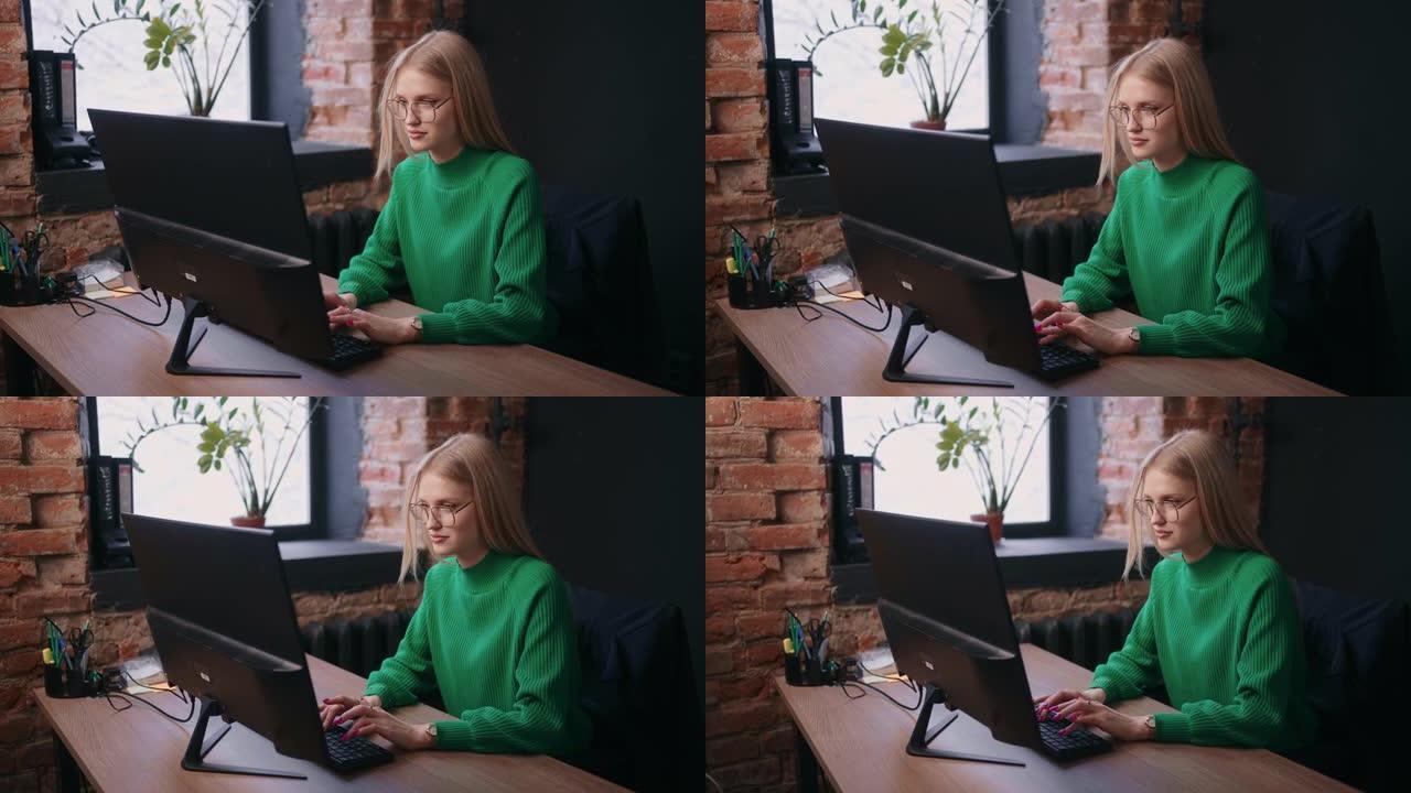 美丽的白人妇女在办公室工作，使用功能强大的计算机，在键盘上键入文本