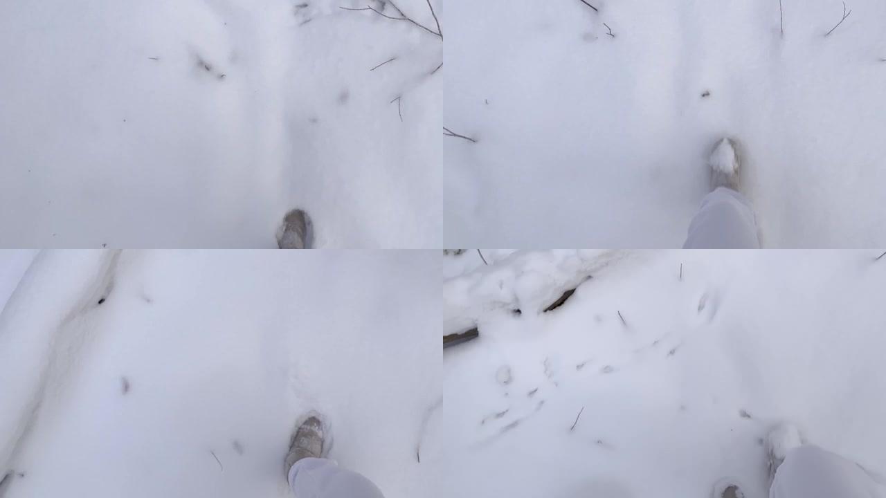 靴子在新鲜的雪中留下脚印。冬季在山区或森林中散步或远足。冬季户外活动