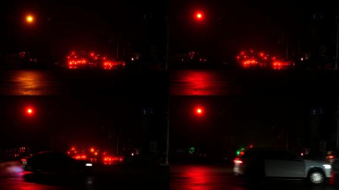 夜间汽车在没有路灯的情况下沿着大道行驶。