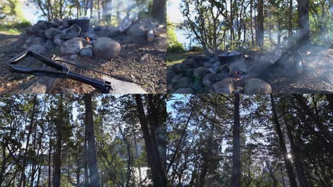 铁锹和铸铁锅在阿根廷巴塔哥尼亚los alerces国家公园的一个湖边的露天篝火上做饭。