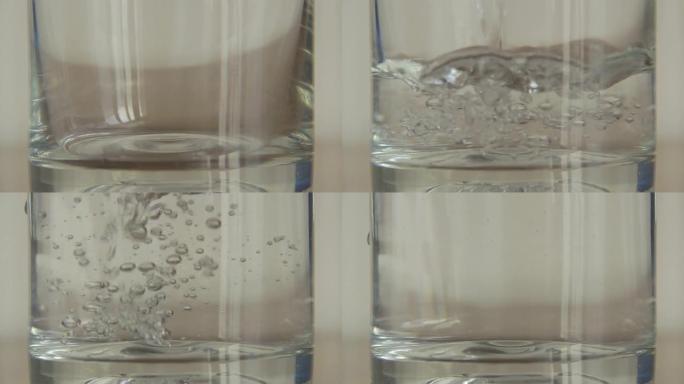用声音把水倒在玻璃里。极端特写