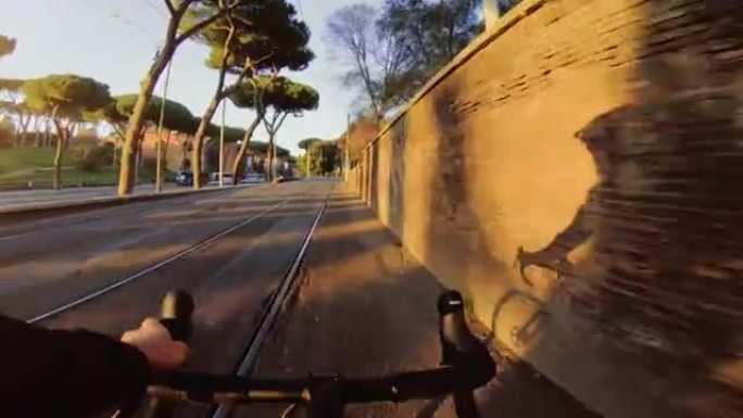 POV riding: road bicycle shadow on the wall
