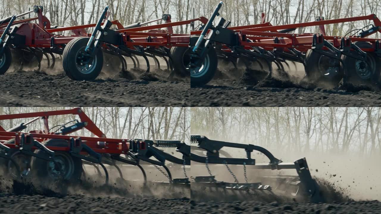 红色的凿子犁使土壤松动。框架在运动中，相机跟随犁。农业机械4K。