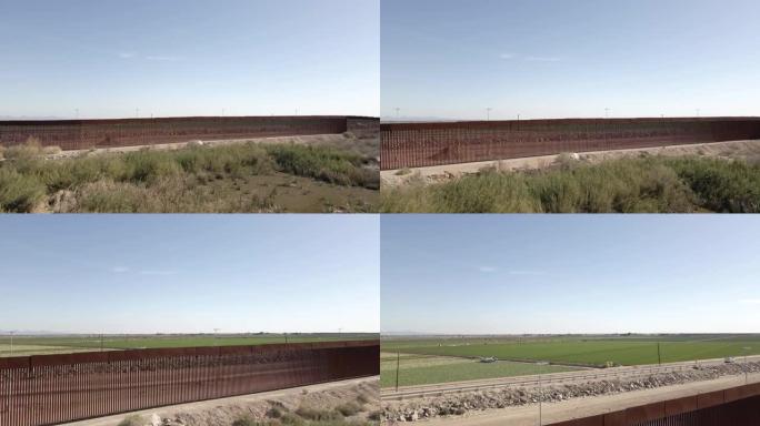 无人机鸟瞰边境墙，科罗拉多引水大坝在亚利桑那州尤马和阿尔戈多内斯之间的屏障，下加利福尼亚，墨西哥北部