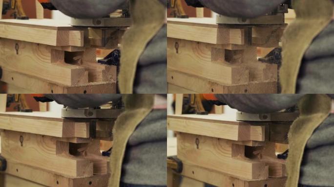 木工车间手工铣床的木匠。电动木材路由器生产家具元件。