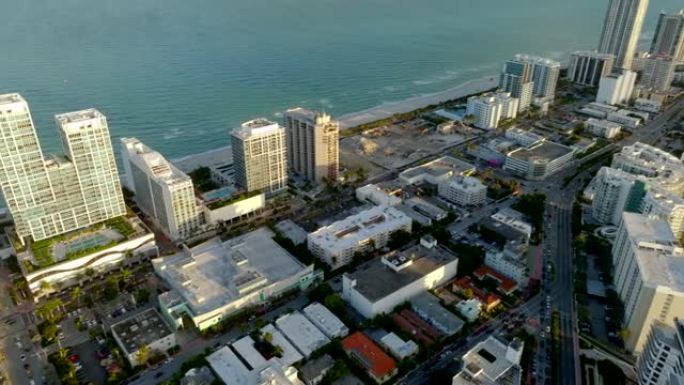 面向迈阿密海滩日落和海洋的高架镜头