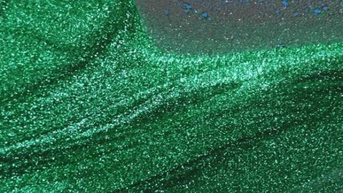 闪亮流体涂料流动绿色闪光纹理波