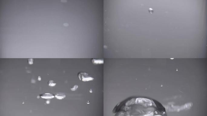 钻石从水中掉落并形成大量气泡