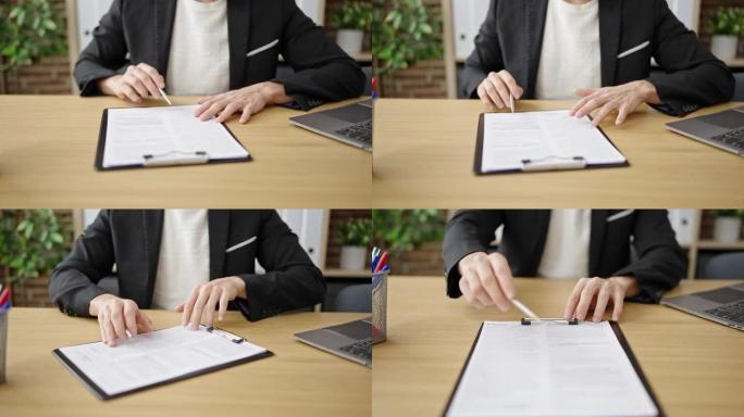 年轻的阿拉伯男子商业工人在办公室签署合同