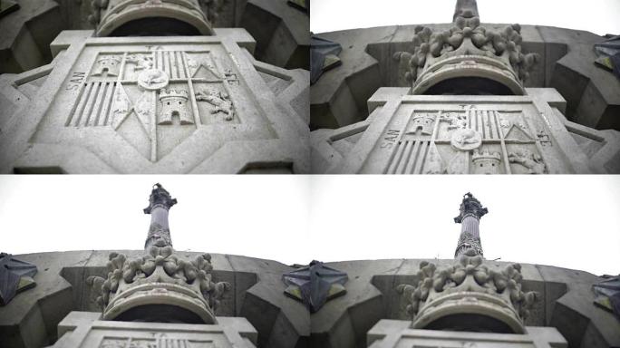 西班牙巴塞罗那哥伦布纪念碑的设计细节，圣达菲徽章