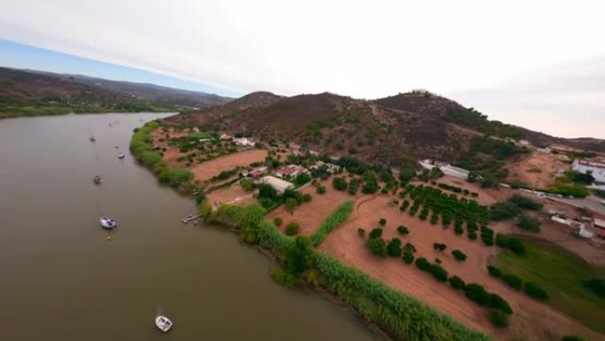 FPV无人机飞行到山上，穿越西班牙圣卢卡尔·德瓜迪亚纳河