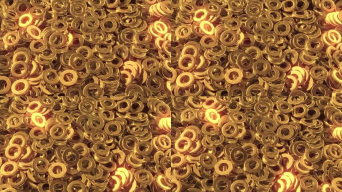巨大的一堆闪闪发光的散落的圆形金色螺母紧固件