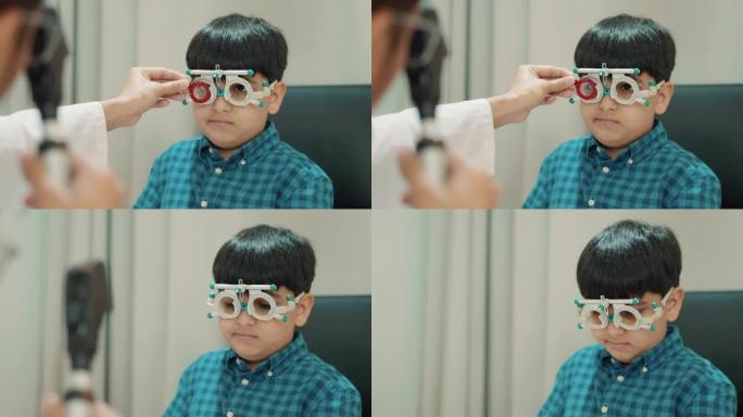 医生用光学试验框架检查男孩视力