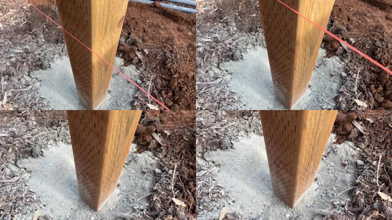 带水平线的栅栏柱可用于混凝土木栅栏施工概念