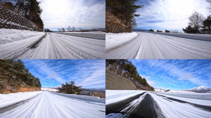 在雪山路上行驶行驶车窗外汽车第一视角