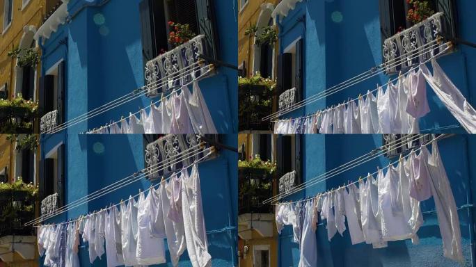意大利户外悬挂的洗衣房，布拉诺岛上的普通生活，传统