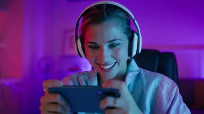 女人游戏，有趣或快乐的手机玩家在视频游戏中玩街机比赛获得奖励积分。笑，笑或兴奋的女孩流媒体手机数字游
