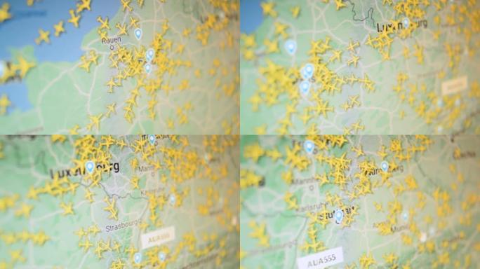 空中交通伦敦卢森堡欧洲城市飞机地图。相机拍摄电脑屏幕。