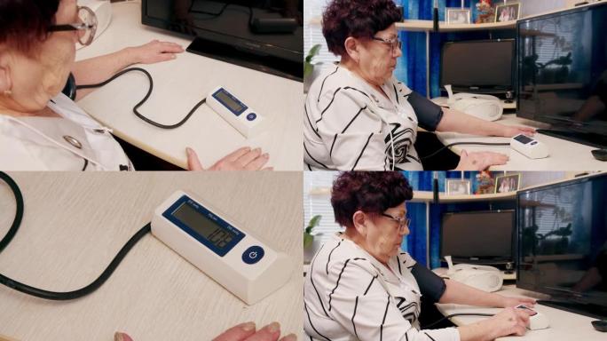 高级妇女在家中使用袖口和眼压计屏幕测量血压