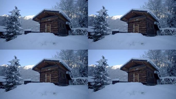 山里一个小雪覆盖的小屋的景色