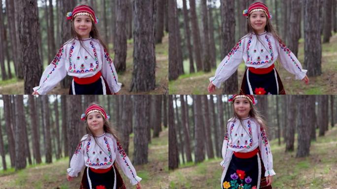 穿着传统民族服装的美丽保加利亚女孩走在山林里。保加利亚自由女人的自然和美丽。